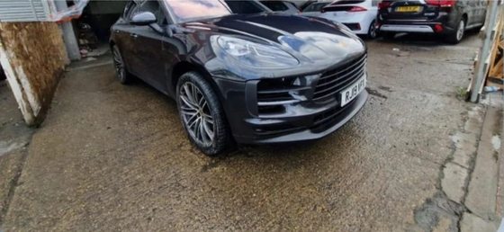 The same Porsche Macan repaired and back on its wheels
