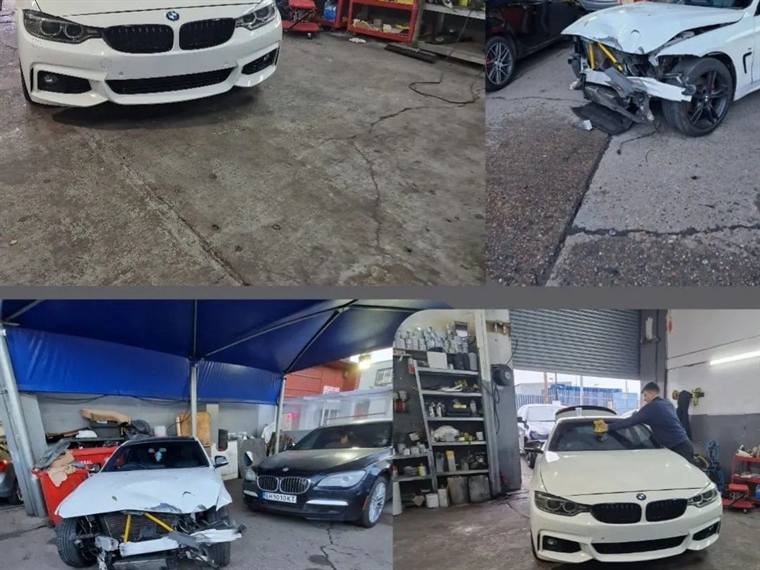 Several cars in for repair inside the N17 Bodyworks workshop