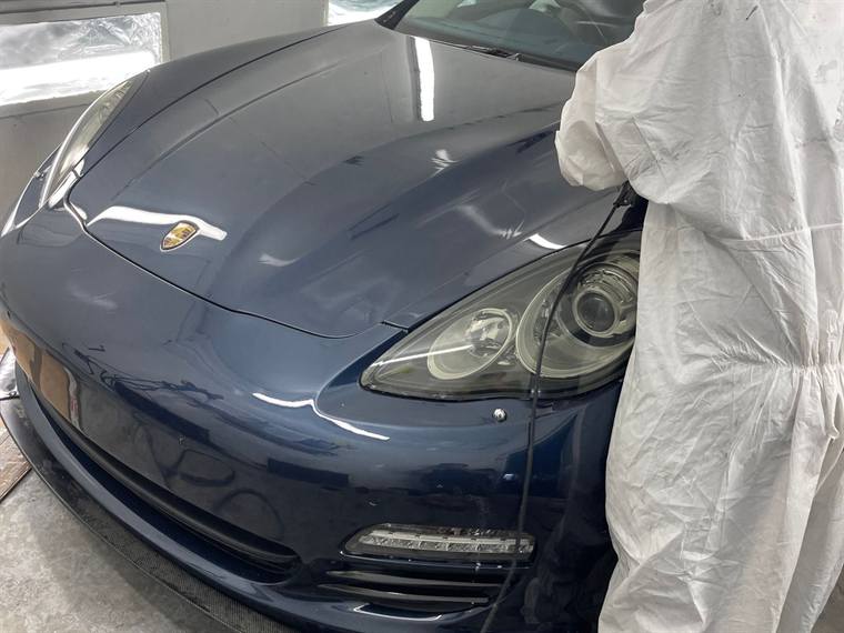 Dark blue Porsche Panamera with finished paintwork